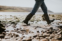 Tourist walking through the beach side trail in Wales