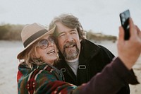 Happy senior couple enjoying the retirement outdoors