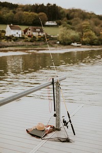 Fishing equipment on a a lake pier