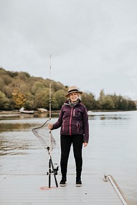 Retired senior woman on a fishing trip
