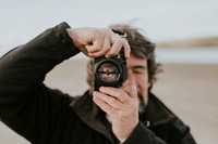 Senior photographer takes a nature landscape shot