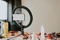 Blank phone screen, LED ring light, beauty blogger kit