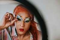 Show artist applying makeup tutorial video, beauty blogger
