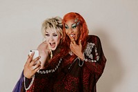 Beautiful drag queens taking selfie