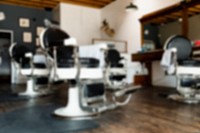 Retro chairs in barber shop, blurred background, small business design