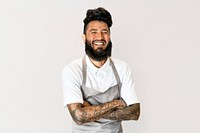 Cheerful tattooed man in apron, small business owner, half body