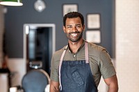 Happy hair stylist in barber shop