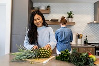 Cooking hobby, preparing pineapple in the kitchen