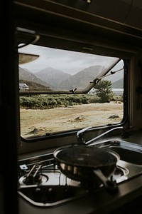 Open kitchen window in campervan, travel photography