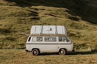 Vintage van aesthetic background, camping in nature, Scottish Highlands