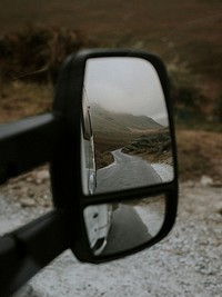 Rearview mirror view, roadtrip in Scotland 