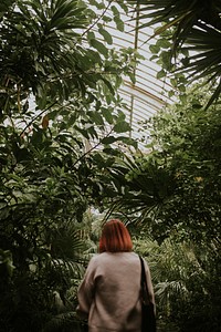 Red haired woman in Kew Garden, London