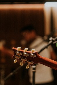 Musician playing guitar background, aesthetic photography