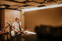 Guitarist recording in studio music HD photo