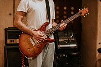 Musician playing guitar aesthetic photography