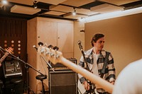 Musician playing guitar, aesthetic photography