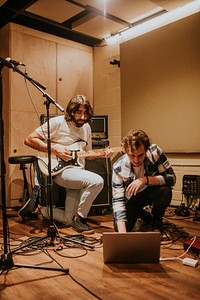 Musician playing guitar, aesthetic photography