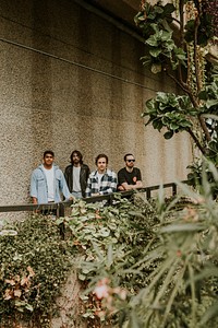 Men posing in garden, botanical greenhouse photoshoot 