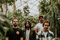 Men posing in garden, botanical greenhouse photoshoot 