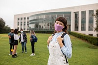 Girl wearing mask at campus in the new normal