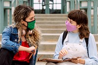 Students studying outdoors at school in the new normal