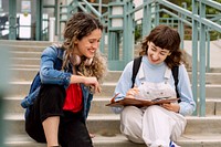 Diverse students studying together at college campus