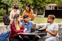 Diverse exchange students studying together at American university