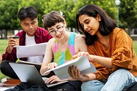 Students studying together outdoors at the campus