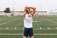 Top mockup psd on man warming up by stretching before exercise psd