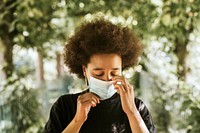 Woman wearing surgical mask in public