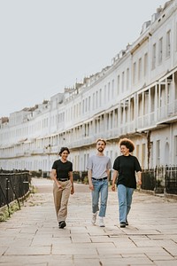 Three friends strolling in the city 