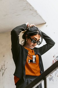 T-shirt mockup psd on Indian woman wearing sunglasses