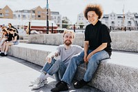 Two friends sitting on the steps