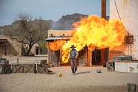 Action scene featuring a fireball explosion at Old Tucson, a movie studio and theme park just west of Tucson, Arizona.