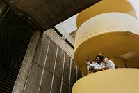 Diverse skaters taking selfie at yellow stairs