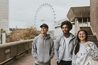 Three friends strolling in London