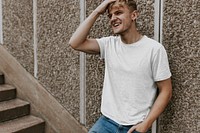 Happy blond man in basic white tee