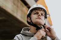 Male skater wearing white helmet