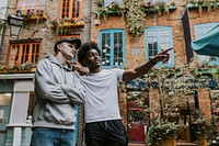 Diverse men strolling in city