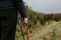 Man carrying a bow saw 