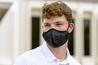 Fabric face mask mockup psd, black design, new normal lifestyle