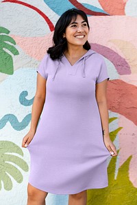 Pastel purple dress on a confident Latina woman, creative graffiti art