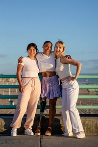 Beautiful diverse women, inclusive group of friends posing together