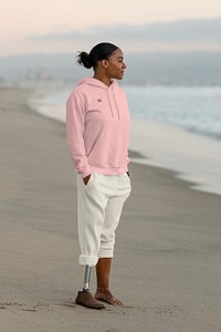 Casual hoodie mockup psd, disabled woman standing by the beach