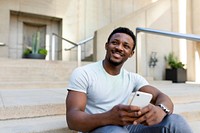 Happy man using a smartphone