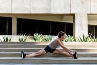 Woman stretching during her morning exercise 