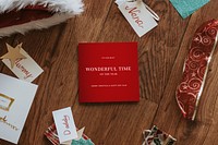 Christmas card mockup psd, on wooden floor, festive stationery