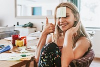 Sticky note on young girl forehead, homeschooling in the new normal