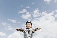 Kids background, boy riding a bike, family photo