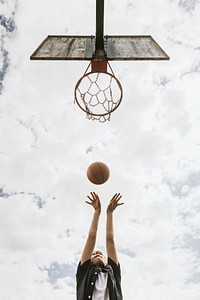 Sport background, young boy playing basketball, summer hobby